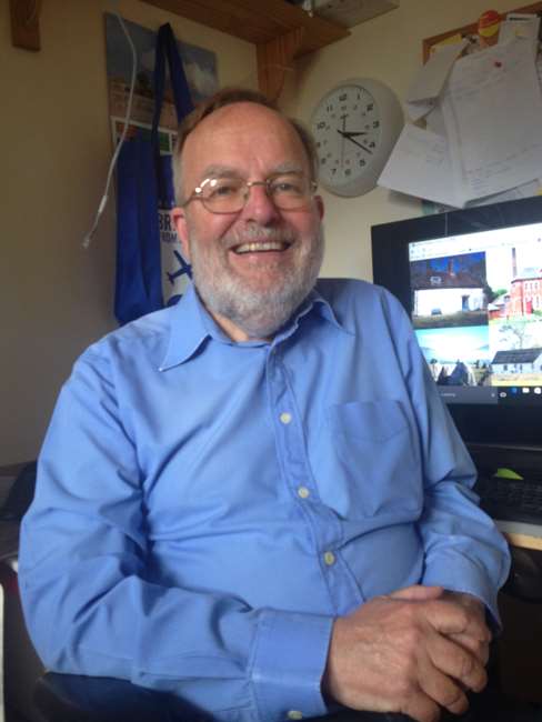 David Lovell sitting in front of his PC